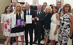 GEM Appeal volunteers: founder Karen Johnson holding the Queen's Award for Voluntary Service