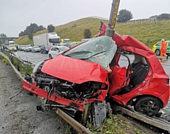 The wrecked car after a collision on the M62 westbound