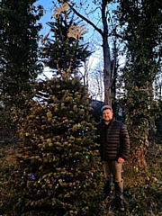 Chairman of Rochdale In Bloom, Roy Down, with the new Norden Christmas tree