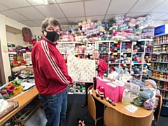 Richard Gelling and Siouxsie Hampson with the handstitched blanket