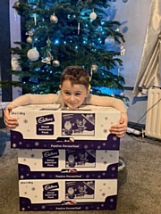 Leo Poulter with some of the selection boxes