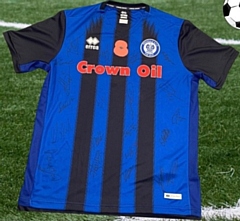 A shirt signed by Rochdale AFC is up for grabs