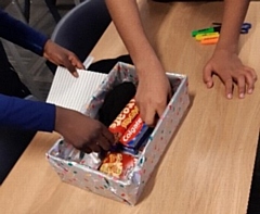 The students created over 50 shoeboxes for vulnerable members of the community