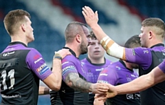 New 2020 signing Andy Lea (centre) after scoring the first try