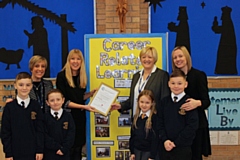 Back row L-R: Jo Manfred, Rochdale Borough Council's inclusion team; Angela Davey, Inspiring IAG; Deborah Hunt, deputy head at St John Fisher; and Nicola Hadfield, headteacher at St John Fisher 