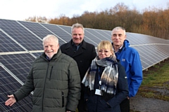 Pictured at the council's solar farm in Rochdale: Councillor Allen Brett, leader of the council; Gary Pilkington, technical building surveying manager; Sam Barker, energy technical support officer; Dave Hughes, senior electrical engineer