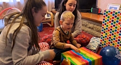 Christian, with his sisters, Jade (left) and Lucy (right)