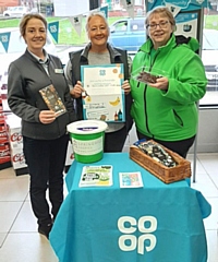 Jane Flynne, the Assistant Store Manager at the Cutgate Store with Barbara Lloyd and Bev Place (centre)