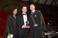 RRG Škoda General Manager Paul Arden picks up the award from TV Presenter Angellica Bell and Škoda UK Sales Director John French