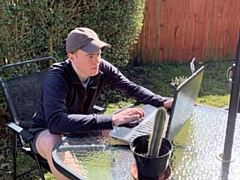 A Hopwood student studying at home