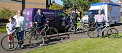 Councillor Rachel Massey and her son, Councillor and NHS Nurse Daniel Meredith, with PCSO Andrew Stewart, PCSO Paul Robinson and Martin Sutton from Positive Cycles