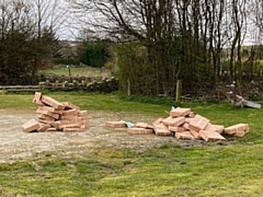 Boxes of partially frozen chicken thighs were dumped in a car park off Wildhouse Lane in Milnrow