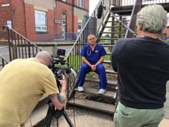 Dr Ahmad Alomar with BBC News cameraman Fred Scott and journalist Fergal Keane 