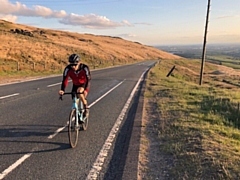 Daniel Taylor riding up Blackstone Edge