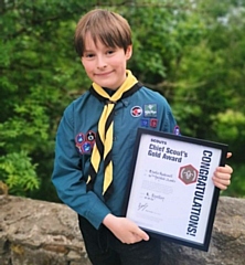 Charlie Hastewell with his Chief Scout Gold Award