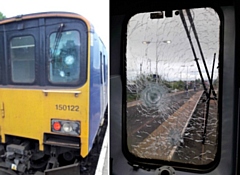 Damage to train window caused by a stone thrown from a bridge