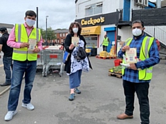 Councillors, health officers and volunteers handed out advice and face masks to residents on Saturday 25 July