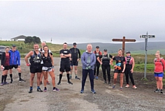 Former race organiser Andy O’Sullivan MBE (centre, grey coat) organised an 'Off Road' Half Marathon for charity