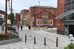 21 Baillie Street is next to the entrance of the Wheatsheaf Shopping Centre, next to Rochdale Riverside