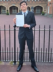 Sohail Turner with his D of E certificate following a presentation in London