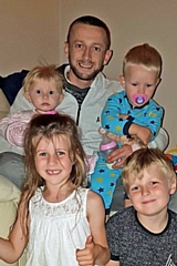 Anthony ‘Enzo’ Evanz with his four children