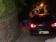 Police stopped this black Golf which was travelling in convoy with a stolen Audi in Haslingden