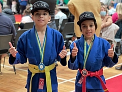 Andrew and Collin Perez with their medals