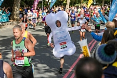 Ben Bate set a new Guinness World Record on Sunday at the London Marathon for Fastest Marathon Dressed as a Body Part (male runner)