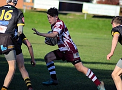 Tom Drennan evading the tackle