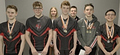 Aquabears members show off their medals