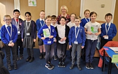 Children from five schools came together at Heap Bridge to edit Yvonne Weatherhead's latest book, Lizzifly in Paradise