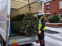 Mike Brennan, the Emporium shop manager, collecting trees back in January 2021