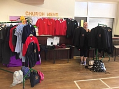 Leonie O’Donoghue with some of the school uniform items ready for collection