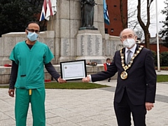 Mayor Billy Sheerin presents a certificate of recognition to Dr Mohammed Zahir (Heywood)