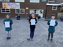 Amelia Newbury, Millie Hastewell, Jools Newbury, all of 40th Rochdale Cubs ,being presented with their Chief Scout Silver Award