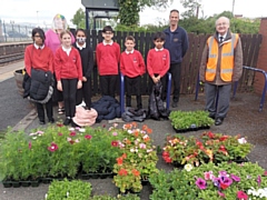 Headteacher Lindsay Torrance supervised Castleton Community Primary pupils, pictured with Richard Hagan of Crystal Doors and Councillor Billy Sheerin