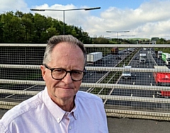 Mark Coleman on a bridge over the M62