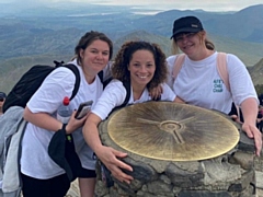 Sammie Rothwell, Sophie Bennion and Donna Barnes at the summit of Snowden