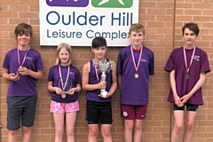 Members of Rochdale Underwater Hockey Club with the Under-12s National Age Group Championships trophy