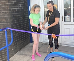 Ambassador for All Aboard CIC, Scarlett King and Director, Beth Kitchen cut the ribbon to officially open the centre