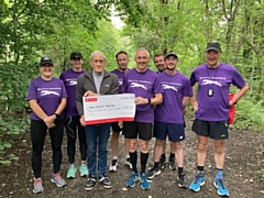 Whit'th Whippets present Bill Noble from 'New Start - the Wythenshawe Hospital Transplant Fund' charity with a £250 cheque 