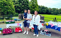 Families making use of the high quality uniform on offer, with Councillor Rachel Massey