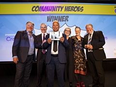 Ed Balls presents to Community Heroes award to Councillor Daalat Ali and council staff 