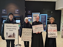 Extinction Rebellion activists held a mock funeral procession at Barclays bank, Rochdale