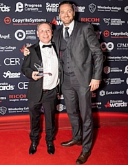 Mike Smith (left) from Cardinal Langley RC High School won School Support Star of the Year at the Educate Awards