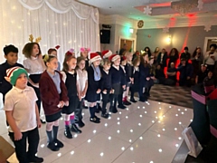 The Key Stage Two choir from Elm Wood Primary School