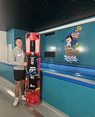 Jolly Josh Centre Lifeguard, Tom with donated board from Ferno