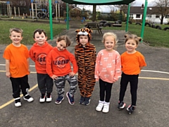 Thorp Primary School wearing orange for Maggie's Oldham