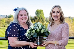 Woman of Rochdale 2022 Sarah Fitchett (left) is presented with the award by the previous winner Carole Kelly (right)