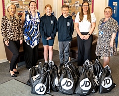 Recruitment Solutions NW has donated back-to-school packs – containing learning essentials, food items and a Nando’s voucher – to Whittaker Moss Primary School